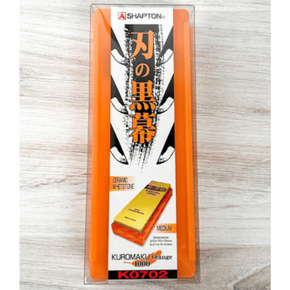 Orange Shapton Ha-No-Kuromaku 1000-grit ceramic whetstone and case